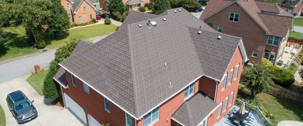 Cottage Shingle Metal Roof - Before and After - This unique offset, multi-grooved, metal roof shingle creates a classic cottage look with all the safety and energy efficient benefits of a metal roof. Cottage Shingle Metal Roof - Before and After - This unique offset, multi-grooved, metal roof shingle creates a classic cottage look with all the safety and energy efficient benefits of a metal roof.