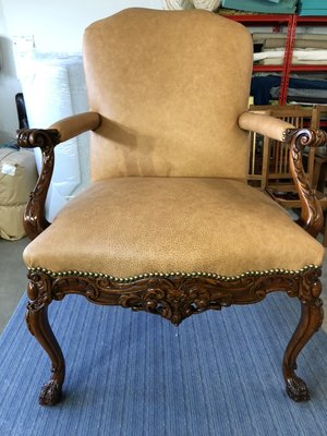 Antique Chair - Complete reupholstery of antique armchair. Chair had complete jute rewebbing and 8-way spring retieing. All new padding with burlap, cotton batting, and polyester batting. Antique Chair - Complete reupholstery of antique armchair. Chair had complete jute rewebbing and 8-way spring retieing. All new padding with burlap, cotton batting, and polyester batting.