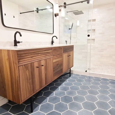 Wedgewood Main Bathroom - Jill and Dave originally asked us to remodel a bathroom and a laundry room at their Hawthorne Hills mid-century home. Once we started, we added another bathroom, a kitchen, and their hardwood floors to the remodel. Essentially, we remodeled their entire house all while they lived there.
It's been quite the adventure for all of us and it could have been really difficult if we all didn't make such a great team. Meanwhile, we focus our energy on working as a team. Teamwork is the key to a successful contracting and remodel experience! Wedgewood Main Bathroom - Jill and Dave originally asked us to remodel a bathroom and a laundry room at their Hawthorne Hills mid-century home. Once we started, we added another bathroom, a kitchen, and their hardwood floors to the remodel. Essentially, we remodeled their entire house all while they lived there.
It's been quite the adventure for all of us and it could have been really difficult if we all didn't make such a great team. Meanwhile, we focus our energy on working as a team. Teamwork is the key to a successful contracting and remodel experience!