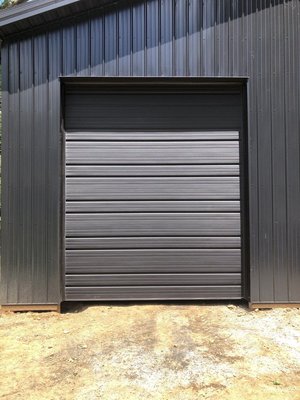 Roll Up Steel Doors - At Door Service Solutions, we understand the demands of commercial and industrial environments. That’s why we’re proud to expand our service offerings to include roll-up steel doors—engineered for durability, security, and space-saving performance.
Whether you’re looking to upgrade your facility’s access points, boost security, or ensure fire code compliance, our heavy-duty roll-up doors are designed to meet your toughest operational needs. As your trusted local garage door experts serving Dayton, Ohio, and the surrounding areas, we now bring the same high-quality service you know and trust to the installation, repair, and maintenance of rolling steel doors. Roll Up Steel Doors - At Door Service Solutions, we understand the demands of commercial and industrial environments. That’s why we’re proud to expand our service offerings to include roll-up steel doors—engineered for durability, security, and space-saving performance.
Whether you’re looking to upgrade your facility’s access points, boost security, or ensure fire code compliance, our heavy-duty roll-up doors are designed to meet your toughest operational needs. As your trusted local garage door experts serving Dayton, Ohio, and the surrounding areas, we now bring the same high-quality service you know and trust to the installation, repair, and maintenance of rolling steel doors.