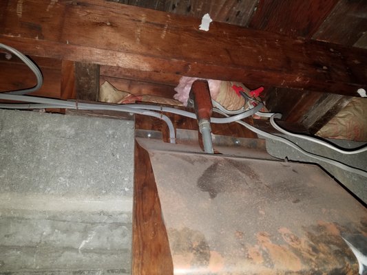 Attic splicing - The homeowner was complaining the the outdoor lighting kept flickering. When we were troubleshooting the system we found an "open air splice" in the attic.  The wires were not terminated correctly which caused the connection to fail.