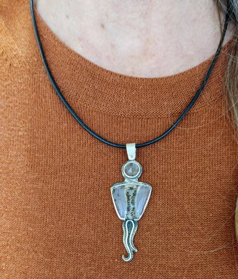 One of a kind Sunstone Necklaces - These are very special artisan pendants created by one of the owners, Steve Douglas. They are one of a kind designs using unusual cabochons chosen for their color and pattern and then combined with our Oregon state gem...Oregon Sunstone! One of a kind Sunstone Necklaces - These are very special artisan pendants created by one of the owners, Steve Douglas. They are one of a kind designs using unusual cabochons chosen for their color and pattern and then combined with our Oregon state gem...Oregon Sunstone!