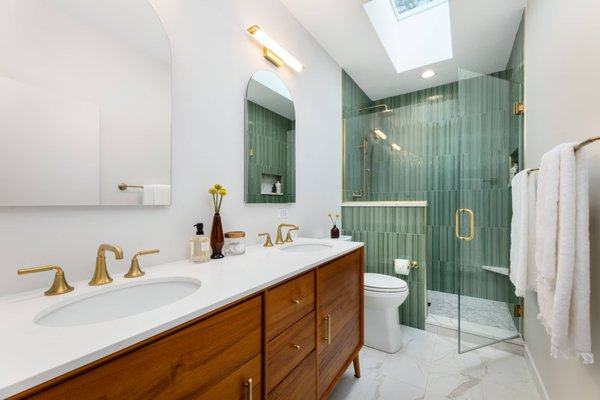 Oakley Bathroom: A Modern Green Refresh - A modern bathroom remodel featuring a white quartz top vanity as a clean focal point, complemented by a green ceramic mosaic tiled shower and an open glass ceiling. Brushed brass fixtures add subtle contrast, while clean lines and natural tones create a calm, fresh, and balanced space with a refined sense of luxury.
Project designed by Chi Renovation, a renowned renovation firm based in Skokie. We specialize in general contracting, kitchen and bath remodeling, and design & build services. We cater to the entire Chicago area and its surrounding suburbs, with emphasis on the North Side and North Shore regions. You'll find our work from the Loop through Lincoln Park, Skokie, Evanston, Wilmette, and all the way up to Lake Forest.
For more info about Chi Renovation, click here: https://www.chirenovation.com/ Oakley Bathroom: A Modern Green Refresh - A modern bathroom remodel featuring a white quartz top vanity as a clean focal point, complemented by a green ceramic mosaic tiled shower and an open glass ceiling. Brushed brass fixtures add subtle contrast, while clean lines and natural tones create a calm, fresh, and balanced space with a refined sense of luxury.
Project designed by Chi Renovation, a renowned renovation firm based in Skokie. We specialize in general contracting, kitchen and bath remodeling, and design & build services. We cater to the entire Chicago area and its surrounding suburbs, with emphasis on the North Side and North Shore regions. You'll find our work from the Loop through Lincoln Park, Skokie, Evanston, Wilmette, and all the way up to Lake Forest.
For more info about Chi Renovation, click here: https://www.chirenovation.com/