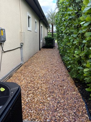 Hardscaping Side Yard Pathway Installation - Tree Trunk Landscapes transformed an underutilized side yard into a functional and visually appealing walkway. Hardscaping Side Yard Pathway Installation - Tree Trunk Landscapes transformed an underutilized side yard into a functional and visually appealing walkway.