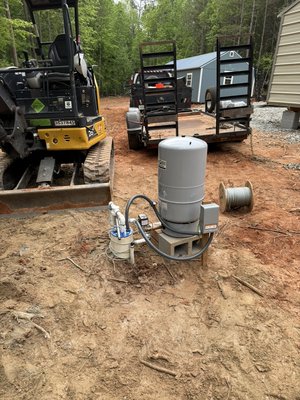 Well Installation - Installed a well pump and service lines. Well Installation - Installed a well pump and service lines.