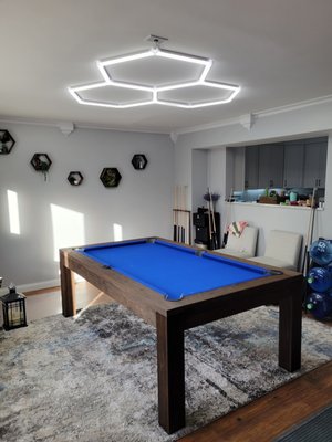 Pool table lighting - The customer badly needed lighting in his family room. Wiring had to be installed to power his LED light fixture and connected to a switch n