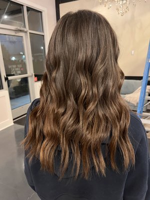 Extensions - These extensions are done by our certified stylists. 
We use Remi Cachet hair which is offered in various colors,  shades and lengths. A consultation is required.