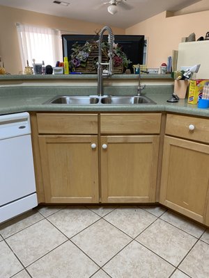 Sink replacement - Replacement of a kitchen sink and faucet. Sink replacement - Replacement of a kitchen sink and faucet.