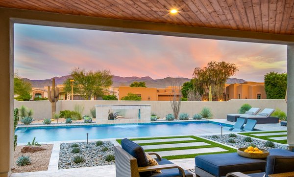 Tonto Verde - Backyard Landscape Installation - Backyard Landscape Design Installation in Tonto Verde. Design includes artificial turf and travertine pool deck, beautiful landscape views, and a pebble walkway. Tonto Verde - Backyard Landscape Installation - Backyard Landscape Design Installation in Tonto Verde. Design includes artificial turf and travertine pool deck, beautiful landscape views, and a pebble walkway.