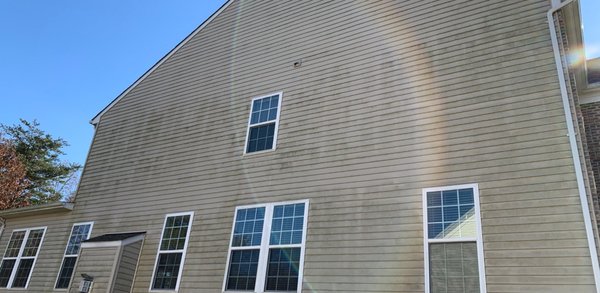 House Wash Transformation - We completely cleaned this property using a soft washer system . Another home . Call us today (716 343 3234
