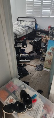 Teenage Boys Bedroom - This teenage boy's room was transformed from a cluttered, chaotic space into an organized and functional retreat.. Everything now has a place, making the room easier to maintain and enjoy..