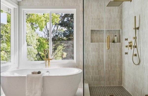 Full Home Remodel: Stylish Comfort with High Ceilings in Hillsborough, CA - At DevArt8 Builders, we take pride in crafting spaces that blend style, functionality, and comfort. Our latest remodel in Hillsborough, CA, showcases the perfect harmony of modern elegance and timeless design. This thoughtfully upgraded home brings together sophisticated interiors, high-end finishes, and a seamless indoor-outdoor flow, making it an ideal retreat for contemporary living.

A Living Room with Warmth & Grandeur

The heart of this home is its cozy yet expansive living room. With high ceilings, floor-to-ceiling windows, and a charming fireplace, the space feels both inviting and airy. Natural light pours in, highlighting the neutral tones, organic textures, and carefully curated decor that create a serene and stylish ambiance.

A Kitchen Designed for Entertaining

Stepping into the spacious kitchen, you’re greeted with a perfect mix of modern luxury and everyday practicality. An L-shaped layout with a large island, custom cabinetry, and state-of-the-art appliances make this kitchen both aesthetic and functional. The sleek countertops and elegant lighting elevate the space, making it a dream for both cooking enthusiasts and social gatherings.

A Spa-Like Bathroom Escape

The primary bathroom is a true retreat, featuring dual vanities, a soaking tub, and a glass-enclosed shower. Elegant gold fixtures and rich cabinetry add a touch of sophistication, while the large windows bring in natural light, creating a spa-like atmosphere perfect for unwinding.

Tranquil Bedrooms for Restful Nights

The well-appointed bedroom is designed to provide a peaceful escape, with plush carpeting, soft lighting, and a soothing color palette. Large windows offer picturesque views, while the subtle luxury in the decor enhances the restful environment.

Seamless Indoor-Outdoor Living

To complete the transformation, the home features an inviting outdoor patio, perfect for relaxing or entertaining guests. A beautifully landscaped backyard, combined with stylish seating and pergola accents, extends the home’s elegance into the outdoors, making it the perfect place to enjoy Hillsborough’s beautiful surroundings.

Final Thoughts

This Hillsborough remodel is a testament to DevArt8 Builders’ commitment to quality craftsmanship, thoughtful design, and exceptional attention to detail. From the grand living space to the luxurious bathroom and seamless outdoor flow, every element of this project was designed with comfort and beauty in mind.

Thinking of remodeling your home?. Contact DevArt8 Builders today for a consultation!