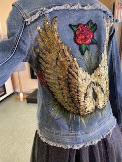 Denim Jacket Redesign - My client was on the verge of throwing this denim jacket away, but decided to bring it in and asked what could be done with it. We redesigned the jacket and gave it new life. Denim Jacket Redesign - My client was on the verge of throwing this denim jacket away, but decided to bring it in and asked what could be done with it. We redesigned the jacket and gave it new life.