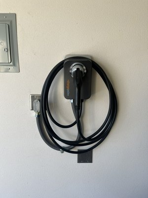 EV Charger - This home needed an EV Charger installed to charge their brand new vehicle. We installed the charger for them and upgraded their breaker to be in compliance with the rest of the panel. The homeowner was ecstatic to be able to charge their new vehicle at home. EV Charger - This home needed an EV Charger installed to charge their brand new vehicle. We installed the charger for them and upgraded their breaker to be in compliance with the rest of the panel. The homeowner was ecstatic to be able to charge their new vehicle at home.