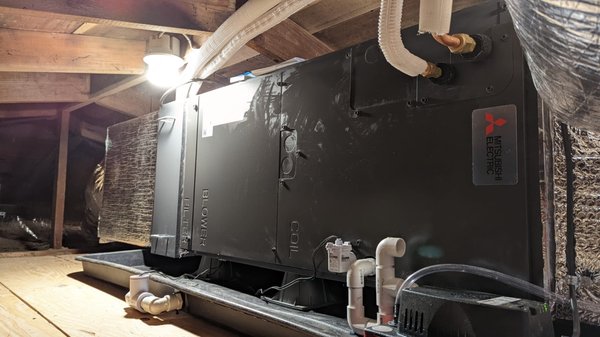 Heat Pump Installation in Felton - For this project we removed an old wall heater from the home. We then installed new ducts through the attic to each of the bedrooms and living space. For the heat pump system which will cool and heat this home we installed a Mitsubishi ducted air handler with outdoor heat pump. This system is highly efficient and very quiet to run.