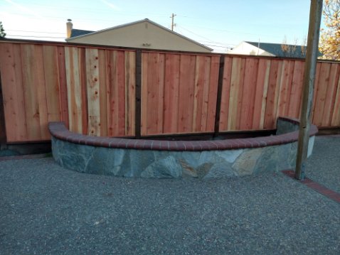 Picture Frame Fences & Gates in San Leandro - When it’s time for a new fence, one of the big questions you need to answer is what type of wood you’d like. While at first glance some wood types may look very similar, there’s more than meets the eye! Redwood is one of the most commonly used wood types in California- and for good reason. It’s durable, resistant to rot and insects, and less subject to swelling and shrinking than other kinds of wood, meaning it will last longer and be less likely to crack or split. Plus, the reddish tones of the wood give it an aesthetically pleasing appearance. Not all Redwood is the same, though! In fact, there are many different ‘grades’ of Redwood. The grade refers to the characteristics and appearance of the lumber. Some of the most commonly offered Redwood grades are: Redwood Con Common, Redwood Con Heart, and Redwood Clear Heart.