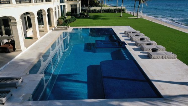 Manalapan Project - The home-owner wanted to spite up their existing Pool with a new Infinity Edge Pool. The project took approximately 5 months to complete. This included the complete demo of the existing Pool, and installation of the new Pool. Manalapan Project - The home-owner wanted to spite up their existing Pool with a new Infinity Edge Pool. The project took approximately 5 months to complete. This included the complete demo of the existing Pool, and installation of the new Pool.