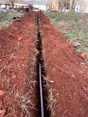 Water line replacement - This home owner had multiple breaks on their water line. Instead of constantly paying for multiple repairs, they decided to replace their old copper water line with pex piping. We replaced from the meter to the craw space, ensuring minimal excavation of their lawn, all code requirements were met, and water was returned to them in a timely manner. We finished this job by backfilling the soil to machine grade + laying seed and straw for a near appearance of the ground until the new grass grew. They were left All Good with our extended 5 year warranty. Water line replacement - This home owner had multiple breaks on their water line. Instead of constantly paying for multiple repairs, they decided to replace their old copper water line with pex piping. We replaced from the meter to the craw space, ensuring minimal excavation of their lawn, all code requirements were met, and water was returned to them in a timely manner. We finished this job by backfilling the soil to machine grade + laying seed and straw for a near appearance of the ground until the new grass grew. They were left All Good with our extended 5 year warranty.