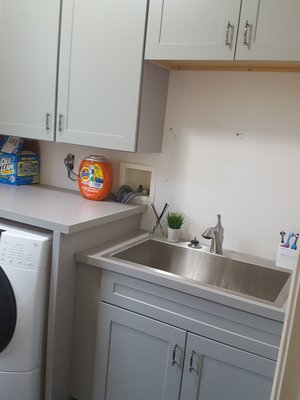 Laundry room - Laundry room- custom built cabbies, cabinets and a 36" slop sink.