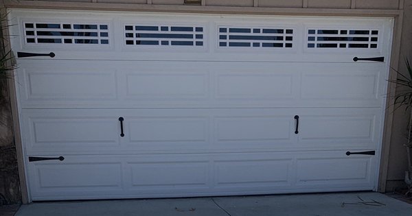 Basic 2-car garage door
White - (Decorations are optional)
Customer asked to have these decorations