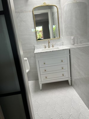 Small Master Bathroom shines w details and style. - 6 foot tile, marble floors and accents, custom no threshold shower floor and drain. Custom smoked glass barn door.
Princess shower valves handle on the left shower head on the right.
Amazing master with stile and details. Small Master Bathroom shines w details and style. - 6 foot tile, marble floors and accents, custom no threshold shower floor and drain. Custom smoked glass barn door.
Princess shower valves handle on the left shower head on the right.
Amazing master with stile and details.