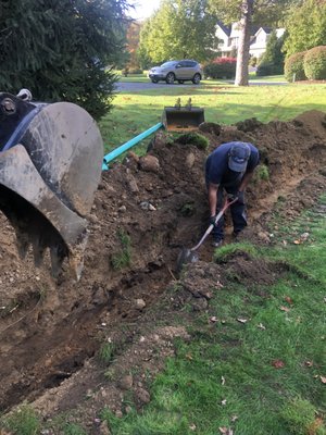 Rain drains from outside house - My customer called me one day to locate and clear the drainage from the gutters we used a high water pressure jet and found that the lines were tied into a dry well close to the house so we got the backhoe we dug it up we rerouted to the backyard far into the woods where the water dumps out and never clogs again now it is totally dry around the house foundation that’s what the owner wanted and that’s what he got he was very happy and so was I Rain drains from outside house - My customer called me one day to locate and clear the drainage from the gutters we used a high water pressure jet and found that the lines were tied into a dry well close to the house so we got the backhoe we dug it up we rerouted to the backyard far into the woods where the water dumps out and never clogs again now it is totally dry around the house foundation that’s what the owner wanted and that’s what he got he was very happy and so was I