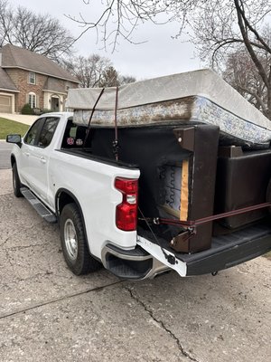 Small pickup done in less then 10 minutes. - Customer needed some old furniture and a bed removed. We easily loaded it up and properly disposed of it.