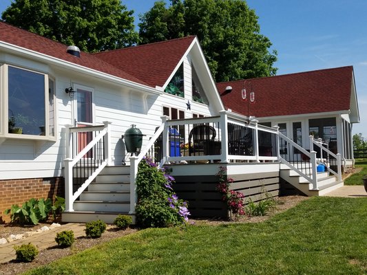 New deck and sunroom - Henrico - Removed the old wornout deck and replaced with this new composite deck, railing and sunroom. New deck and sunroom - Henrico - Removed the old wornout deck and replaced with this new composite deck, railing and sunroom.