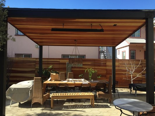 Back yard, patio and exterior renovation - Los Feliz - The client had 100 year old wood paneling that had wood rot, termite damage and peeling paint. We completely renovated the exterior of the home. Including new insulation and waterproofing the entire exterior of the home. The finishing touch was new paint. In the back yard we added a deck and modern pergola. Also added artificial grass the surrounding yard. Back yard, patio and exterior renovation - Los Feliz - The client had 100 year old wood paneling that had wood rot, termite damage and peeling paint. We completely renovated the exterior of the home. Including new insulation and waterproofing the entire exterior of the home. The finishing touch was new paint. In the back yard we added a deck and modern pergola. Also added artificial grass the surrounding yard.