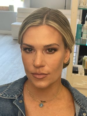 Makeup and low bun updo by Shana - Natural Hollywood glam makeup with effortless-looking low bun updo Makeup and low bun updo by Shana - Natural Hollywood glam makeup with effortless-looking low bun updo