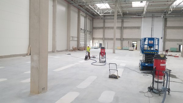 Warehouse Concrete Floor Polishing - Whether you are considering installing an epoxy floor or are looking for polished floors or a decorative finish, we have been installing all sorts of flooring in various commercial, and industrial environments. With over multiple years of industry experience, our crews are highly trained and experienced professionals specializing installing any flooring you'll need based on the performance requirements of a given environment. Whether you need a slip-resistant coating to improve safety or a seamless floor that can be easily cleaned and will not harbor bacteria, we can create a floor system to meet your needs. Warehouse Concrete Floor Polishing - Whether you are considering installing an epoxy floor or are looking for polished floors or a decorative finish, we have been installing all sorts of flooring in various commercial, and industrial environments. With over multiple years of industry experience, our crews are highly trained and experienced professionals specializing installing any flooring you'll need based on the performance requirements of a given environment. Whether you need a slip-resistant coating to improve safety or a seamless floor that can be easily cleaned and will not harbor bacteria, we can create a floor system to meet your needs.