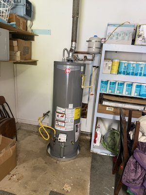 Leaking water heater in garage ￼ - This was a replacement of an old 40 gallon water heater located in the garage of a residence. Almost called me panicking that there was water leaking from their water heater and they had no hot water. Just slow Plumbing came in and installed the water heater same day. ￼