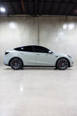 Tesla Model Y Performance Transformation - This 2022 Tesla Model Y Performance received a full matte green wrap, ceramic tint all around 20% with 50% on front windshield and sunroof. Stek light smoke PPF for headlights and fog lights. Stek dark smoke for taillights and reflectors. Full vehicle ceramic coating and chrome delete. Tesla Model Y Performance Transformation - This 2022 Tesla Model Y Performance received a full matte green wrap, ceramic tint all around 20% with 50% on front windshield and sunroof. Stek light smoke PPF for headlights and fog lights. Stek dark smoke for taillights and reflectors. Full vehicle ceramic coating and chrome delete.