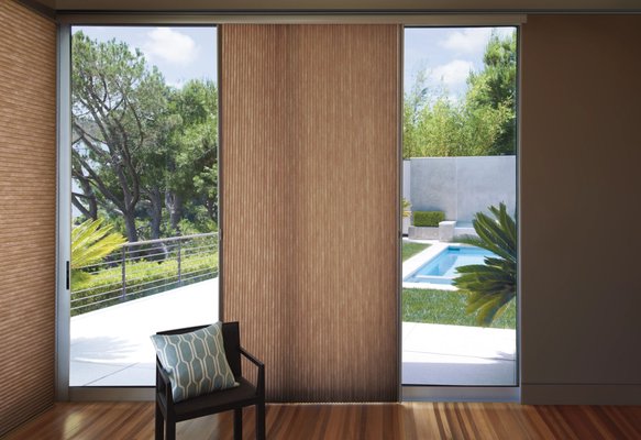 Hunter Douglas Honeyomb Duette Shades - Hunter Douglas Honeycomb Duette Shades are a premium window treatment option designed to enhance both the aesthetic appeal and functionality of any space. These shades feature a unique honeycomb construction that provides excellent insulation, helping to regulate the temperature in a room and potentially reduce energy costs. The cellular design of the shades also helps to absorb sound, creating a quieter and more peaceful environment.

The Duette Shades come in a variety of colors, textures, and opacities, allowing for customization to suit different decor styles and light control preferences. They offer versatility in light filtering options, from sheer to opaque, providing privacy while still allowing natural light to filter through. Additionally, these shades are designed with child safety in mind, featuring cordless operating systems for ease of use and peace of mind.

Overall, Hunter Douglas Honeycomb Duette Shades combine style, functionality, and energy efficiency to create a sophisticated window treatment solution for any home or office space.