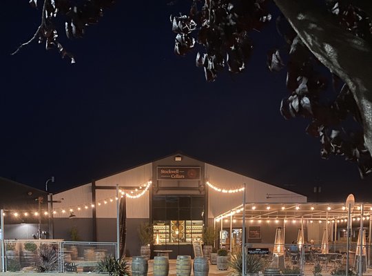 ⭐️ Come & Visit Stockwell Cellars 🍇 - Proud to be among the growing urban winery scene in Santa Cruz, our warm and welcoming tasting room feels more like a brewpub than a stuffy winery. Handcrafted wood and metal tables, made by our metal-worker founder, mingle with local art and relaxing sofas nestled among dancing firelight. Lounging in our tasting room is a little like gathering around a modern version of the village smithy. ⭐️ Come & Visit Stockwell Cellars 🍇 - Proud to be among the growing urban winery scene in Santa Cruz, our warm and welcoming tasting room feels more like a brewpub than a stuffy winery. Handcrafted wood and metal tables, made by our metal-worker founder, mingle with local art and relaxing sofas nestled among dancing firelight. Lounging in our tasting room is a little like gathering around a modern version of the village smithy.