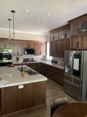 Walnut Custom Kitchen In Rocklin CA - This remodel was a mix of new cabinets in the kitchen and refacing the rest of the home to match the finishes created in the kitchen.   Project was in Rocklin CA.  

Give us a call for a free estimate 916-747-6235