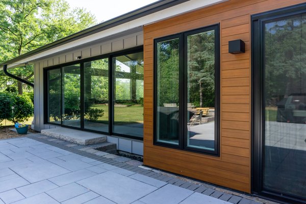 Major Glow up to this Lake Forest Home using James Hardie + Longboard Siding & New Windows - The homeowner wanted to update his homes siding and windows while also brightening up the home and making it more modern. We were able to achieve this beautiful transformation using James Hardie Board & Batten Siding in the Color Pearl Gray and Longboard Siding accents in the color Dark Fir. We also replaced the windows, soffit, fascia, gutters and garage doors. What a stunning transformation! Major Glow up to this Lake Forest Home using James Hardie + Longboard Siding & New Windows - The homeowner wanted to update his homes siding and windows while also brightening up the home and making it more modern. We were able to achieve this beautiful transformation using James Hardie Board & Batten Siding in the Color Pearl Gray and Longboard Siding accents in the color Dark Fir. We also replaced the windows, soffit, fascia, gutters and garage doors. What a stunning transformation!