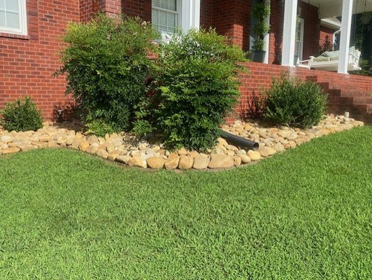 Landscaping Services 2024 - I specialize in improving/upgrading your home's curbside appeal. In this project I replaced the existing mulch with 6"-12" Pigeon Stone.