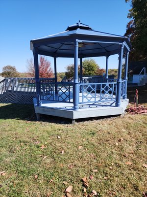 Crum's Pool Area - This is the Crum's freshly painted pool deck and gazebo. It was the worst color of turquoise and the deck had really bad looking painted as