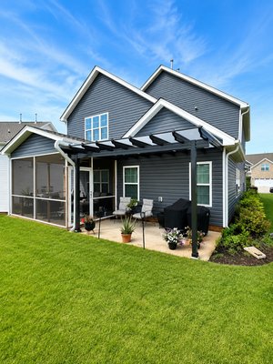 Renaissance Fresco Aluminum Pergola — Colfax, NC - This Colfax homeowner wanted it all — and they got it. We installed a Renaissance Fresco aluminum pergola paired with a screened enclosure, giving them a beautiful outdoor space they can actually use year-round. The pergola adds that open-air feel while the screen room keeps the bugs out and the comfort in. Clean lines, low maintenance, and built to last. This is what Carolina Backyard Living does — we bring your backyard to life.​​​​​​​​​​​​​​​​