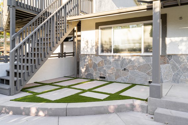 Casino Residence - This project located in Vista, California was once an empty area with nothing but dead grass and cracked concrete. Once a design was made and agreed upon the existing area was demoed and excavated. As is seen in these pictures a cohesive design was made and the perfect blend of materials were selected to create this beautiful outdoor oasis and the design was brought to life. This project consisted of A water/fire feature, Concrete, Concrete steps, Turf, arbors, pergola, and Flagstone accents Casino Residence - This project located in Vista, California was once an empty area with nothing but dead grass and cracked concrete. Once a design was made and agreed upon the existing area was demoed and excavated. As is seen in these pictures a cohesive design was made and the perfect blend of materials were selected to create this beautiful outdoor oasis and the design was brought to life. This project consisted of A water/fire feature, Concrete, Concrete steps, Turf, arbors, pergola, and Flagstone accents