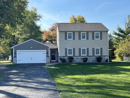 Home Makover - This project was the result of a wind storm, mostly paid for by the insurance company. We installed an Atlas Pinnacle Pristine roofing system, brick veneer, board & batten siding on the garage and lap siding on the house. Shutters were painted to match the accent color on the garage. Contact us at 614-918-0018 or visit our website to schedule your home project consultation! Home Makover - This project was the result of a wind storm, mostly paid for by the insurance company. We installed an Atlas Pinnacle Pristine roofing system, brick veneer, board & batten siding on the garage and lap siding on the house. Shutters were painted to match the accent color on the garage. Contact us at 614-918-0018 or visit our website to schedule your home project consultation!