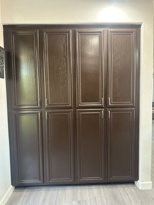 Kichen cabinet painting - Last week, we gave a kitchen in Lake Side, Chula Vista a fresh new look by painting the old brown cabinets into a clean two-tone style—white on top and gray on the bottom. The update brightened up the space and added a nice modern touch. Check out the before-and-after photos to see the difference!