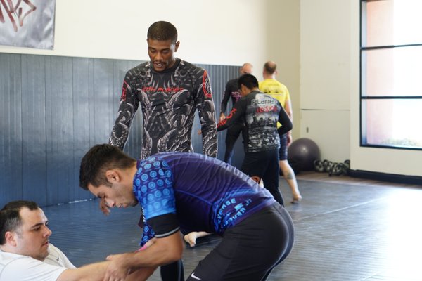 Adult Nogi Jiu Jitsu Program - This adult membership includes unlimited attendance to all available classes. 

We will provide multiple levels of Jiu Jitsu instruction. Each class will provide progression determined by the experience of the students.

Beginner: The focus in this class will be movement, and basic 1-2 part sequences, and learning the Dark Arts Warm Ups, duration 60 minutes. Created for students with 1 week until until 6 months.

Intermediate: The focus in this class will be mastering the Dark Arts Warm Ups and that is a requirement to attend this class. The curriculum will include beginner sequences and 2-6 part sequences, cardio cool down and live drilling and sparring. Recommended for students training for 6 months - 2 years. The duration for this class will be 75-90 minutes.

Advanced: The focus of this class is very similar to intermediate expectations, and it is required for to know Dark Arts warm ups and Leg Lock warm ups. This curriculum will include Intermediate style sequences, cardio cool down, live drilling, and sparring. The recommended length of training will be at least 1 year to new students. The duration for this class will be 120 minutes.