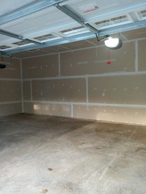2 car garage - This project was a drywall finishing and painting job. The customer wanted the drywall finished, primed, caulked, and painted. Also had me repaint 2 exterior doors and add trim.