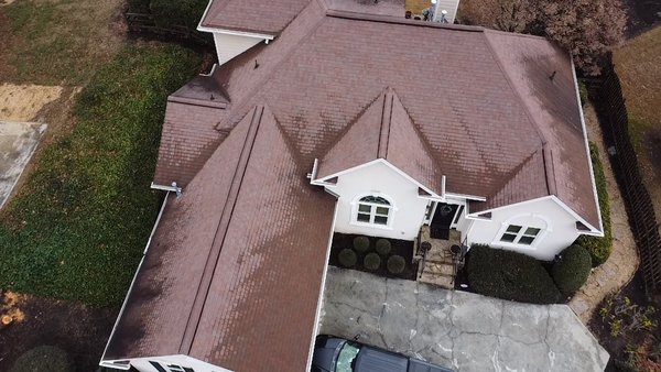 New Roof Replacement - This is a beautiful transformation from an old roof to a new GAF Tiimberline HDZ in Hickory color shingles. We also replaced and installed new gutters, toppers, and downspouts.