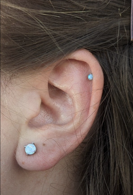 Ear Piercing - Sideshow Piercing is well known for using the best quality piercing jewelry. Come in and we can curate your ear to enhance your beauty. Walk -Ins Welcome..