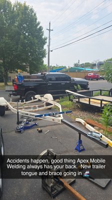 Boat trailer repair work and welding. - Damaged boat trailer that was refurbished with new materials.