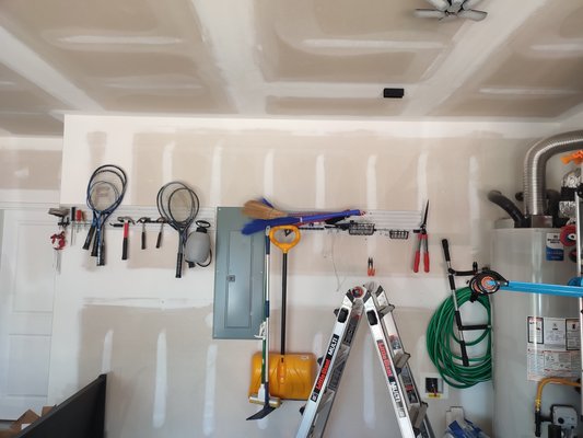 Garage Storage & Bike Lift Installation - Installed a ceiling-mounted bike lift in the garage to free up floor space and make bike storage more convenient. The project included positioning the lift, mounting the hardware securely to the ceiling, installing the pulley system, and testing the bike lift after installation. Garage Storage & Bike Lift Installation - Installed a ceiling-mounted bike lift in the garage to free up floor space and make bike storage more convenient. The project included positioning the lift, mounting the hardware securely to the ceiling, installing the pulley system, and testing the bike lift after installation.