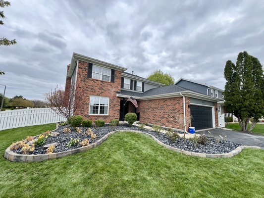 FRONT ENTRANCE PLANTER BED - Front entrance with a nice all season plant, bushes and trees selection with a beautiful stone edger. FRONT ENTRANCE PLANTER BED - Front entrance with a nice all season plant, bushes and trees selection with a beautiful stone edger.